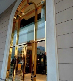 CỬA BẢN LỀ SÀN MỞ QUAY 2 CÁNH UỐN VÒM